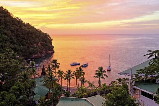 Bay with palm beach of the Anse Chastenet Hotel at sunset, Soufriere, St. Lucia, Lesser Antilles, West Indies, Caribbean Islands