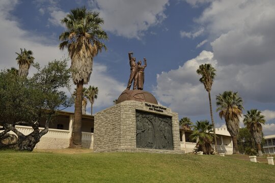 Sculpture of a black couple ripping the chains of white subjugation, symbol for end of slavery, in front of the Alte Feste, Windhoek, Namibia