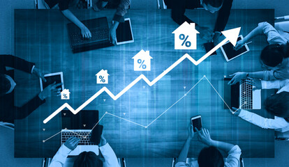 A dynamic team engages in real estate market analysis, showcasing a growth graph and digital...