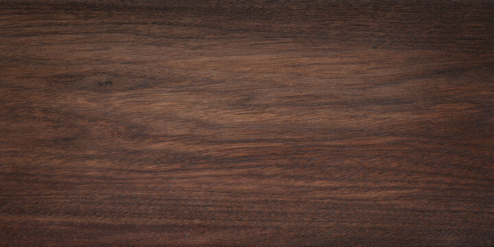 Wide format black walnut natural texture desktop background. Walnut wood texture background. 