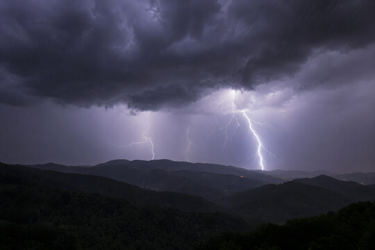 Lightning Strike Across Mountain Hills
