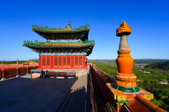 Traditional glazed ceramic stupa finial on the rooftop terrace of the Great Red Terrace at Putuo Zongcheng Temple, Chengde, Hebei, China