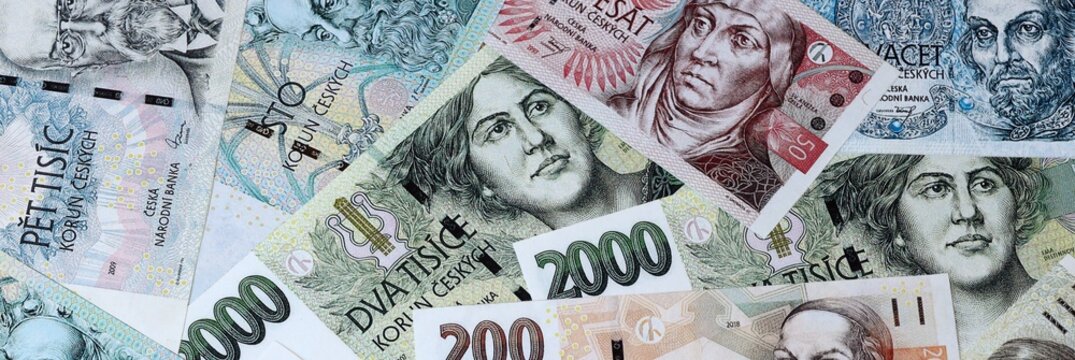 Czech koruna money bills in pile on table. Czech Republic CZK currency cash close up