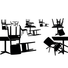 Fototapeta premium Silhouette of overturned chairs and tables in a cafe.