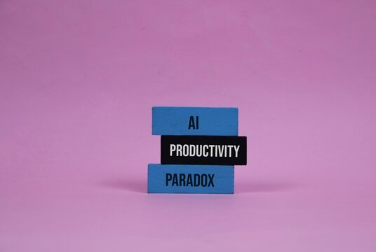 AI Productivity Paradox Concept With Stacked Blocks On pink Background Representing Automation And Efficiency Dilemma