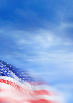 Close up blurred motion American flag in dramatic sky