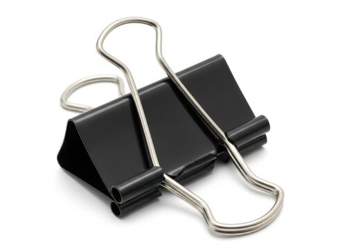 A close-up view of a black binder clip with a silver wire.
