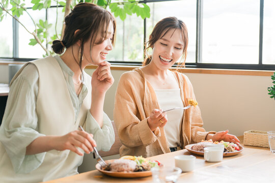 Women enjoying a delicious lunch with their female friends/mom friends (girls' get-together)