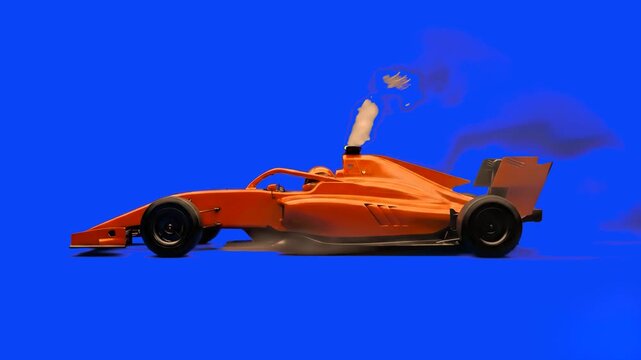 A bright orange single-seater Formula racing car simulating high-speed movement in place. Isolated on a blue screen, the asset features fast spinning wheels, burning exhaust heat effects, and dark smo