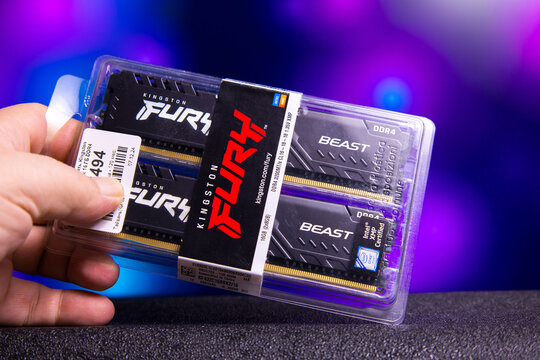 Kingston Fury Beast DDR4 RAM modules displayed in transparent retail packaging. Black memory sticks with distinct heat spreader design featuring the Fury and Beast branding. Packaging includes brandin