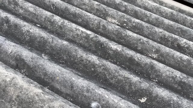Corrugated asbestos roof sheet texture close up