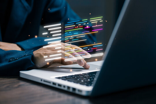 Closeup of programmer typing on laptop with colorful coding interface, software development, programming language, web application and digital technology concept.