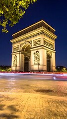 Fototapeta premium A nighttime view of a historic monument with streaks of light