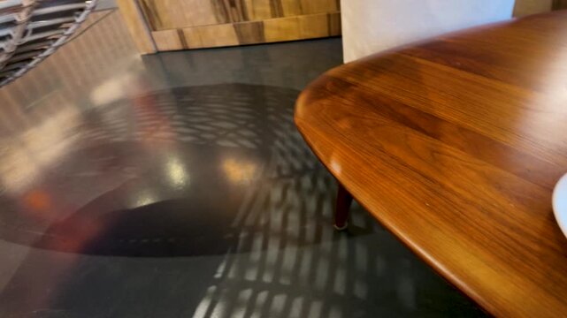 Espresso Cup and Smartphone with Navigation Map on Cafe Table