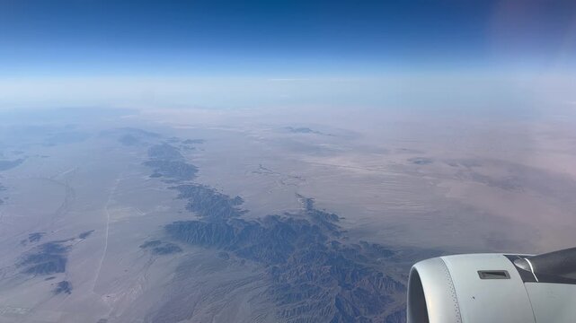 Desert Landscape High Altitude View From a Passenger Plane
