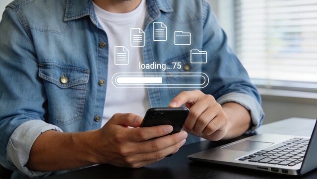 Person uploading files to cloud storage on mobile phone, loading bar progress showing document transfer and data synchronization process.
