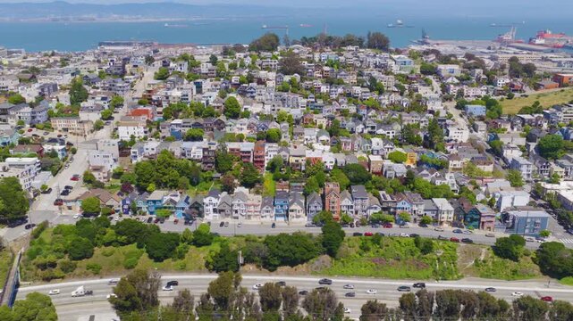 San Francisco Potrero Hill Lateral Aerial View With Bay and Colorful Homes 01