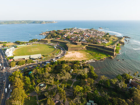Aerial view of the historic Galle Fort and the cricket stadium along the coast with the Indian Ocean in the background Galle, Southern Province, Sri Lanka.