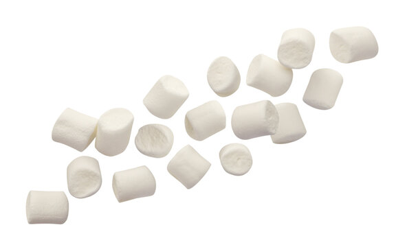 Mini marshmallows flying on a white background. Isolated
