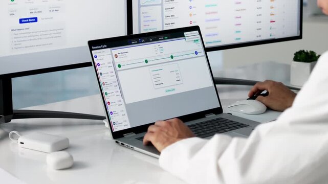 Healthcare Billing Manager Reviews Patient Claims On Laptop