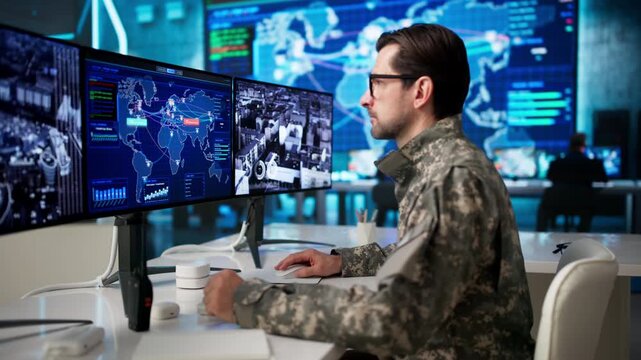 Soldier Uses Advanced Computer Technology In Military Command Center