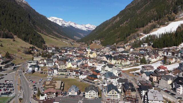 Ischgl Village in Austrian Alps - Aerial Pullback on a Sunny Day