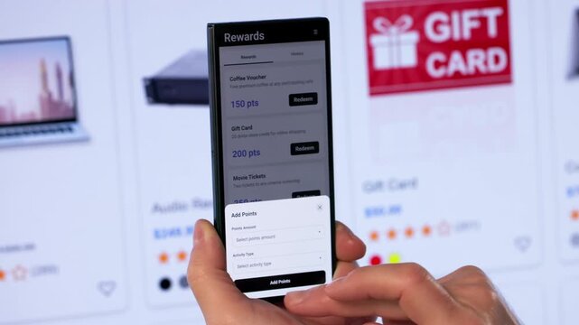 Person Using A Loyalty App On Phone
