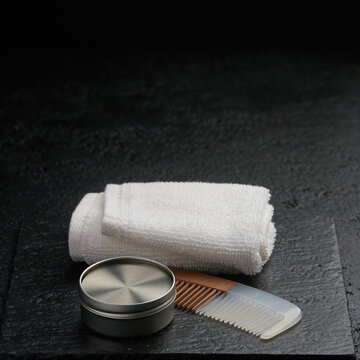 Men's grooming kit with towel and comb