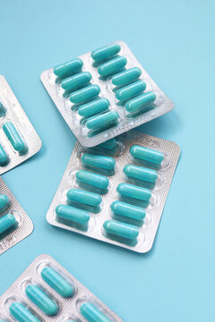 Blue capsules of Doxycycline in blister packs.