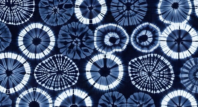 Dark blue circular tie dye pattern with organic radial resist textures