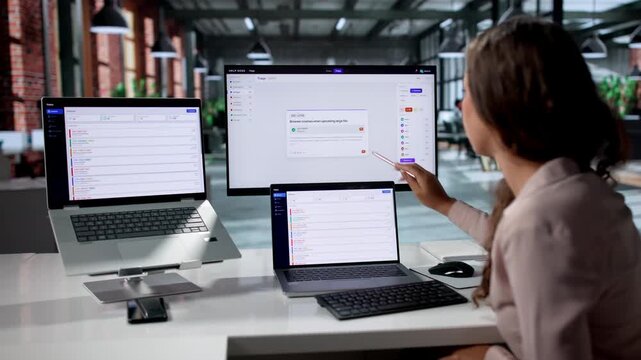IT Support Specialist Resolves Incident Tickets Using Laptop