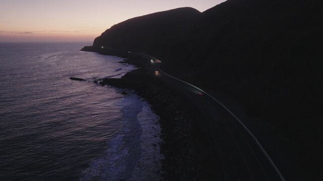 Dusk Car Tracking Winding Oceanside Pacific Coast Highway PCH Aerial 