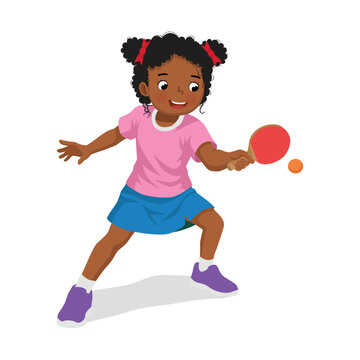 Little African girl playing table tennis hitting the ping pong ball with paddle