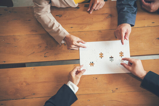 Unified synergy assembly business game implementation multiple puzzle meeting. Business connections strategy synergy team solution. Implement puzzle improve communication solve synergy organize team