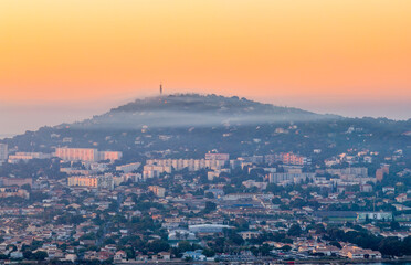 Fototapeta premium Sunrise over Mont Saint Clair in Sète, Occitanie, France