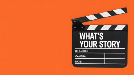 Naklejka premium A film clapper board on an orange background with the words What's Your Story