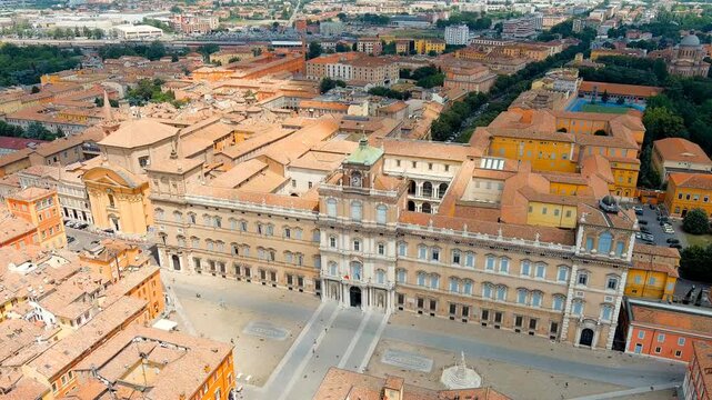 Modena, Italy. Palazzo Ducale, the Baroque ducal palace with its symmetrical facade and central clock tower, Drone footage over Piazza Roma and the historic center under bright summer light. Drone fo