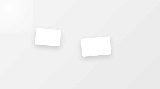 Two floating minimalist blank white rectangular cards with soft, gentle shadows against a clean, neutral light gray background, offering a serene and versatile design template