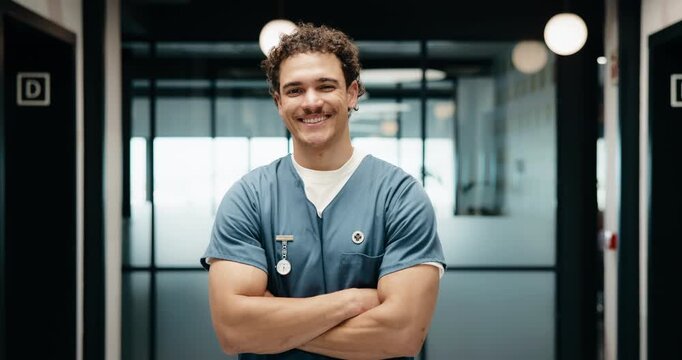 Portrait, man and nurse with arms crossed in hospital for learning, internship and medical trainee. Smile, male person or confident for education, nursing program and healthcare practice for wellness
