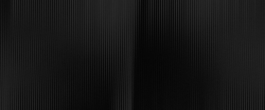 dark monochrome background (black and dark gray) with Vertical Stripes Pattern and black steel texture that has been finely brushed so that it reflects light linearly
