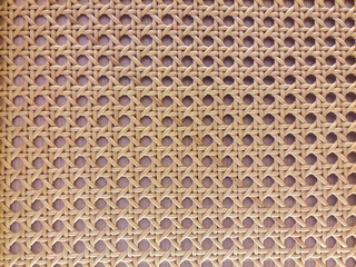 Fototapeta premium Woven rattan texture background with geometric pattern