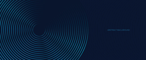 Abstract circular blue line pattern on dark background with glowing light effect and corporate design style. © Azahar