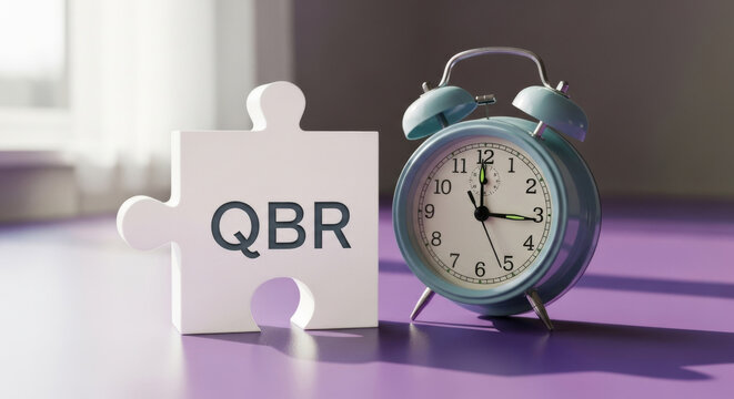 An artistic shot of a pastel blue alarm clock next to a white puzzle piece inscribed with 'QBR', symbolizing time management.