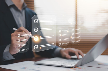 Business checklist and task management concept with digital to do list interface on laptop. Project planning, workflow organization, productivity tracking and corporate management technology. © ภัทรชัย รัตนชัยวงค์