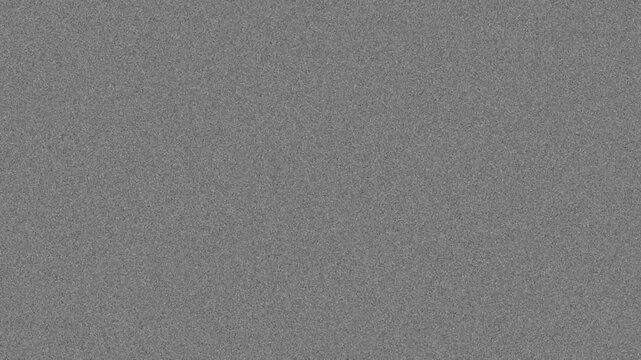 16mm film grain texture overlay with dust and scratches on gray background, seamless loop