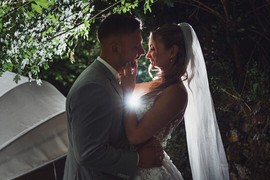  happy, laughing bride and groom at the wedding. Celebrate an emotional wedding.