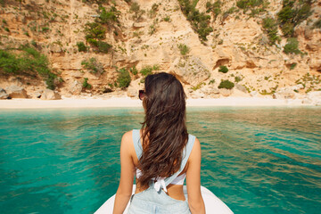 Obraz premium Ocean, thinking and woman with boat for holiday, tropical adventure and planning for solo travel trip. Summer break, raft and person with decision for vacation, sea view and back in Thailand