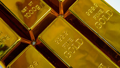 Pile of gold ingot texture © Thicha