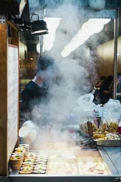 Food stall with steam at the night market, Taipei, Taiwan
