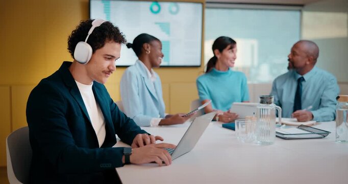Finance, headphones and laptop with man in meeting for review of data charts or statistics. Graphs, streaming and typing with broker in boardroom of financial workplace for investment planning